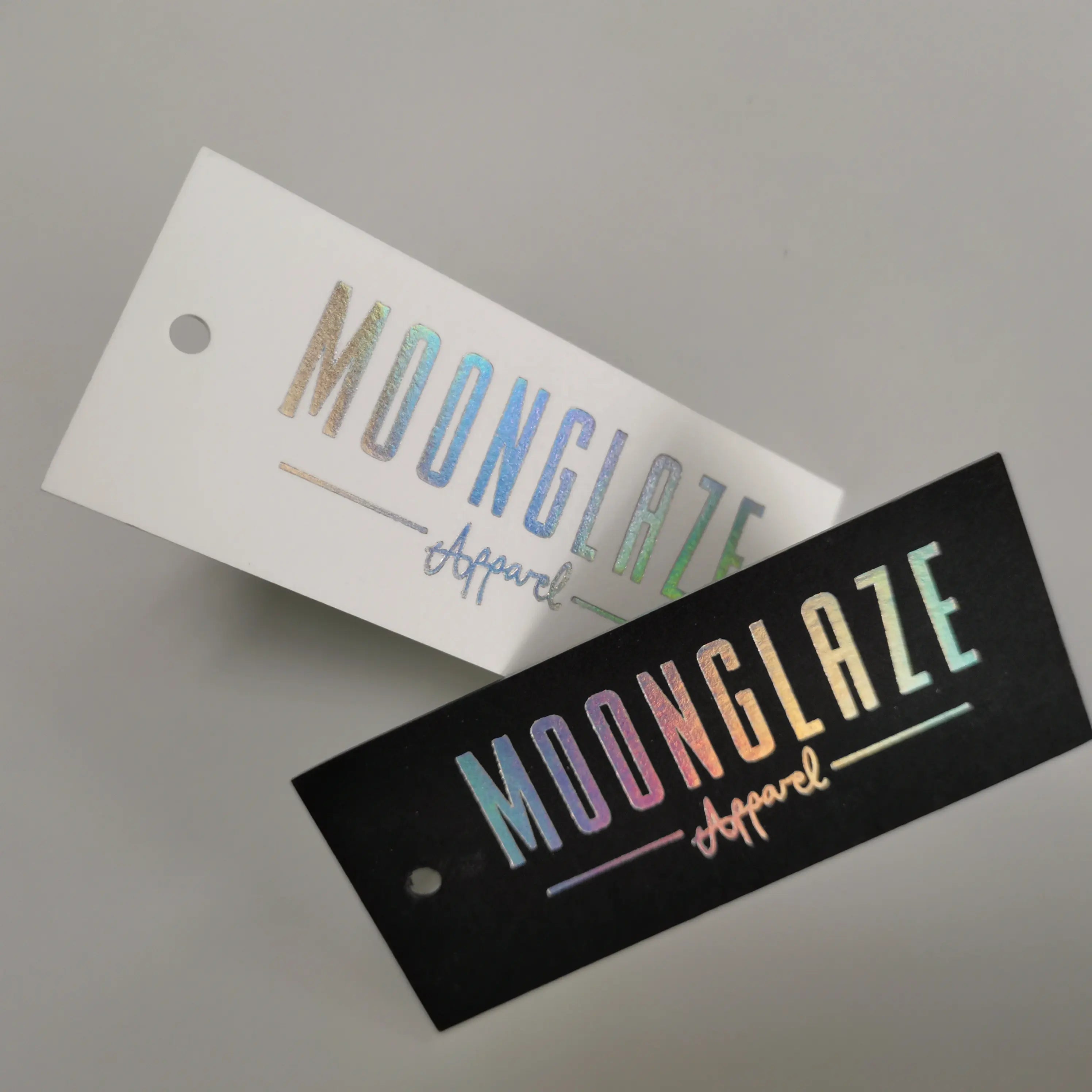 High quality custom size paper hang tags with holographic foiling