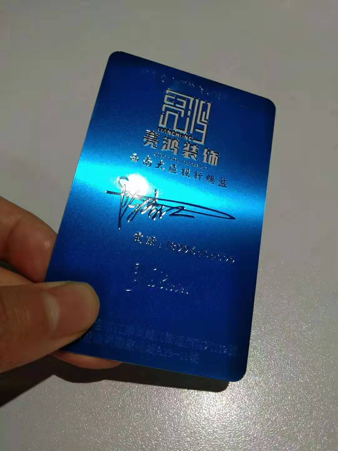 Blue Metal Business Cards with Gold Foil Printing